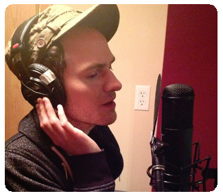 Ian Gildersleeve laying down a vocal track in the new vocal booth